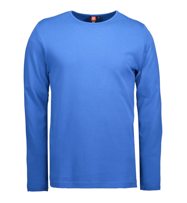 Interlock T-shirt langærmet azur Blå langærmet T-shirt med rund hals ses forfra mod en hvid baggrund. Mærket “ID” er synligt indvendigt ved nakken.