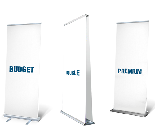 Tre reklamebannere står ved siden af hinanden med tekst på hvert: "BUDGET" på det venstre banner, "DOUBLE" på det midterste, og "PREMIUM" på det højre. Baggrund er grå med skygger.