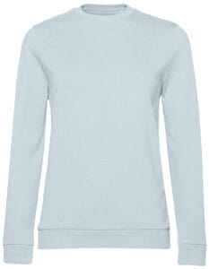 Lyseblå sweatshirt liggende fladt på hvid baggrund. Voxtstrikken er synlig ved ærmekanter, hofte og hals. Ingen tekst eller logoer er til stede.