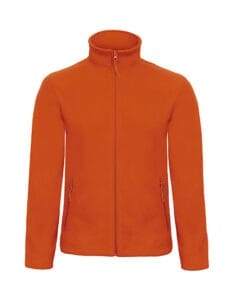 Orange fleecejakke med lynlås og høj hals, to lynlåslommer på forsiden. Ingen tekst eller dekorationer.