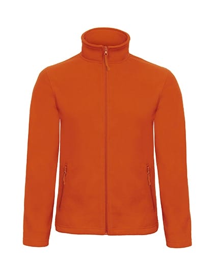 Orange fleecejakke med lynlås og høj hals, to lynlåslommer på forsiden. Ingen tekst eller dekorationer.