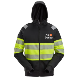 Sort jakke med hætte og refleksstriber, viser teksten "Dit Design" ved brystet, omgivet af skiftevis lysegrønne og grå striber. Jakken vises på en hvid baggrund.